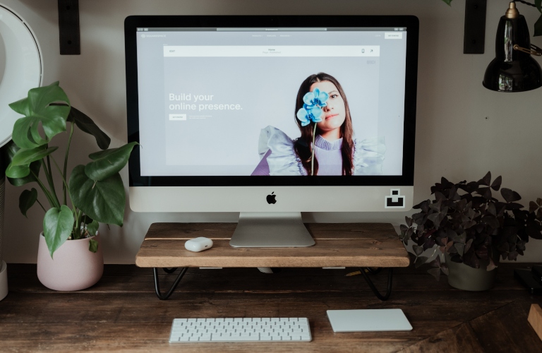 Squarespace on a screen on a desk