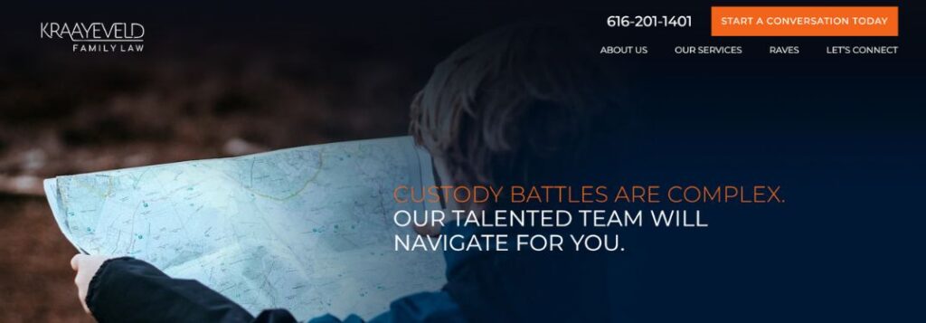Boy Reading Map with Orange and White Text for Kraayeveld Family Law Homepage