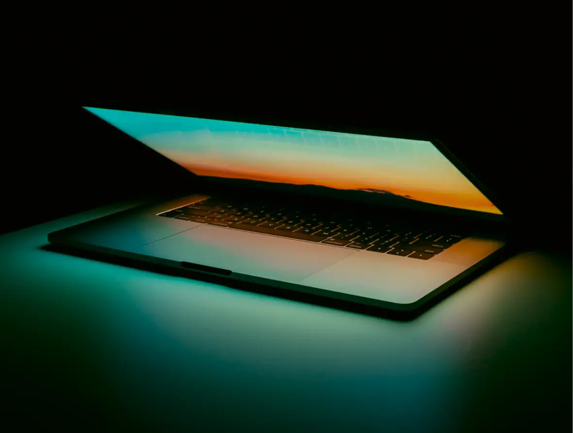 a laptop in the dark