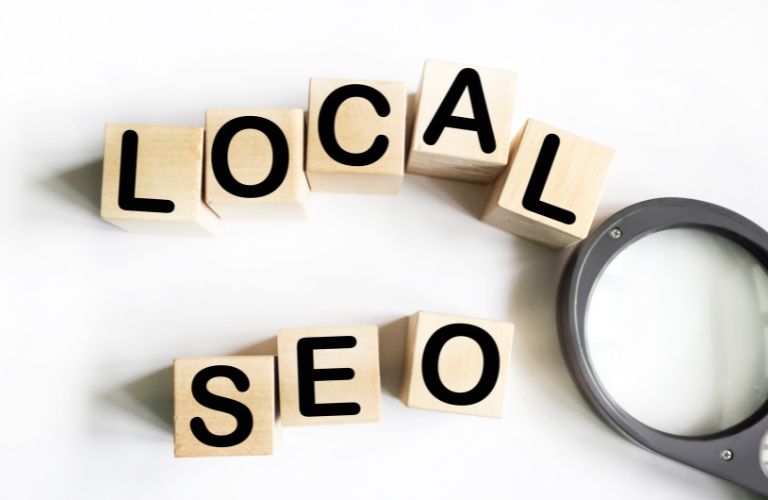 Local SEO Letter Blocks with Magnifying Glass