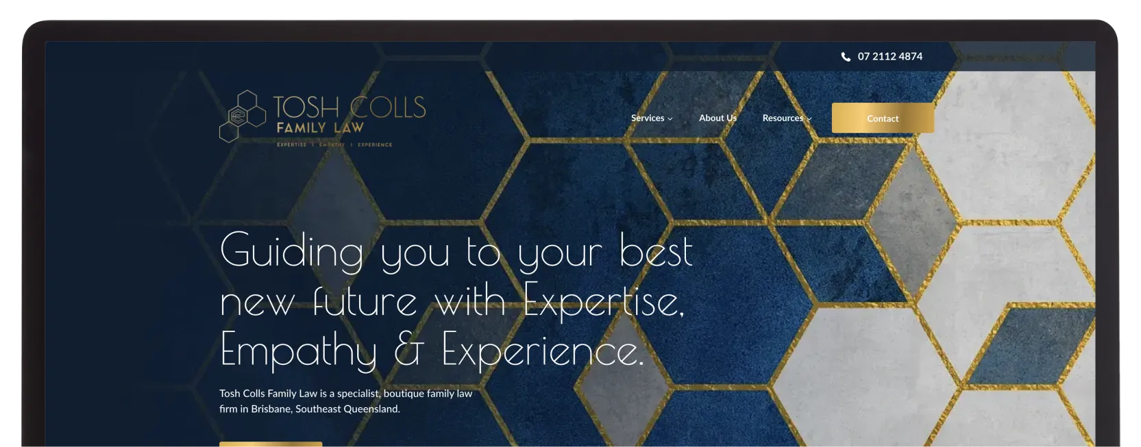 Website homepage of Tosh Colls Family Law featuring blue and gray hexagonal patterns with gold outlines, and text promoting expertise, empathy, and experience.