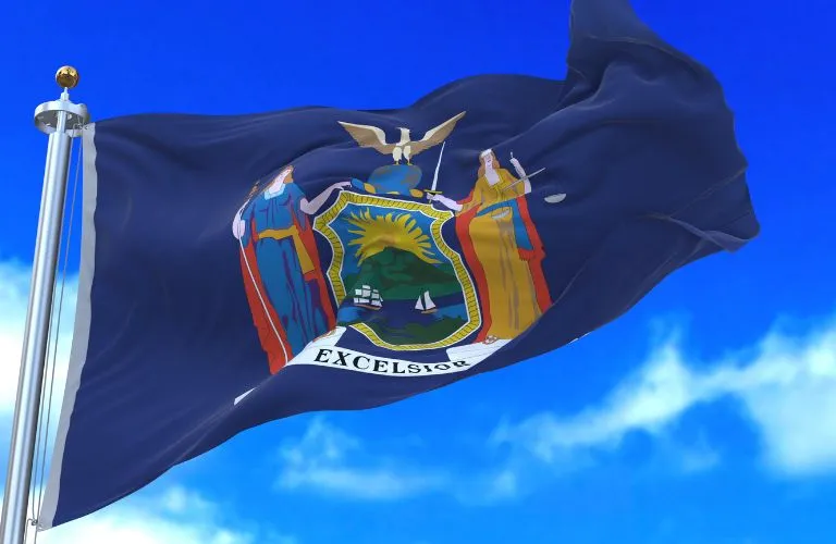 New York State Flag Waving in the Sky

