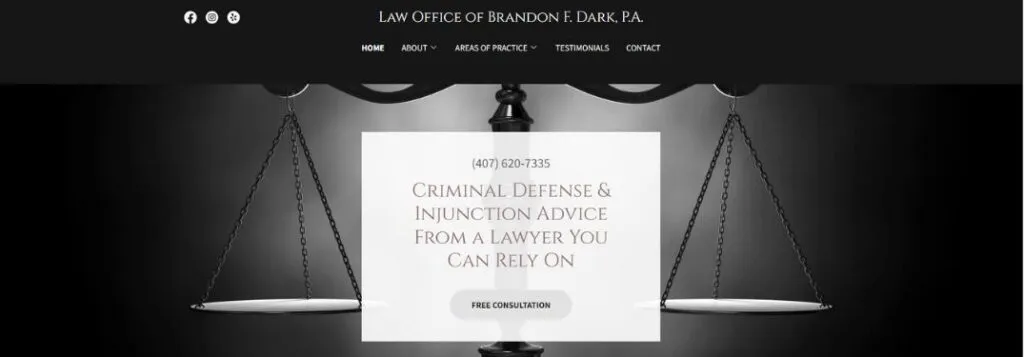 Black and White Image of Scales of Justice with Text on Brandon Dark Law Website