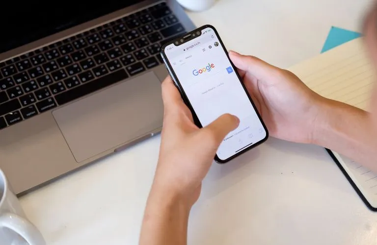 Person Using Google on Their Phone