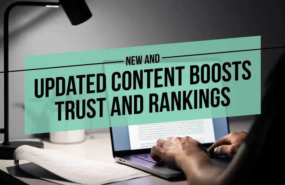 Person Working on Laptop with Green Text Box and Black New and Updated Content Boosts Trust and Rankings Text