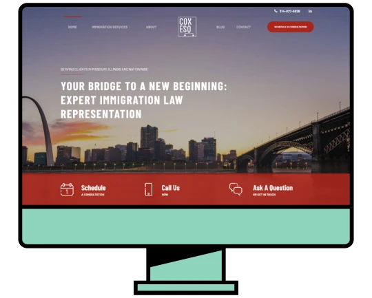 Computer monitor displaying the CoxEsq immigration law website with a dark red theme and the St. Louis skyline.