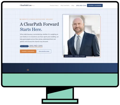Computer monitor displaying ClearPath Law website with a professional portrait of a bald man in a suit and text about legal services.